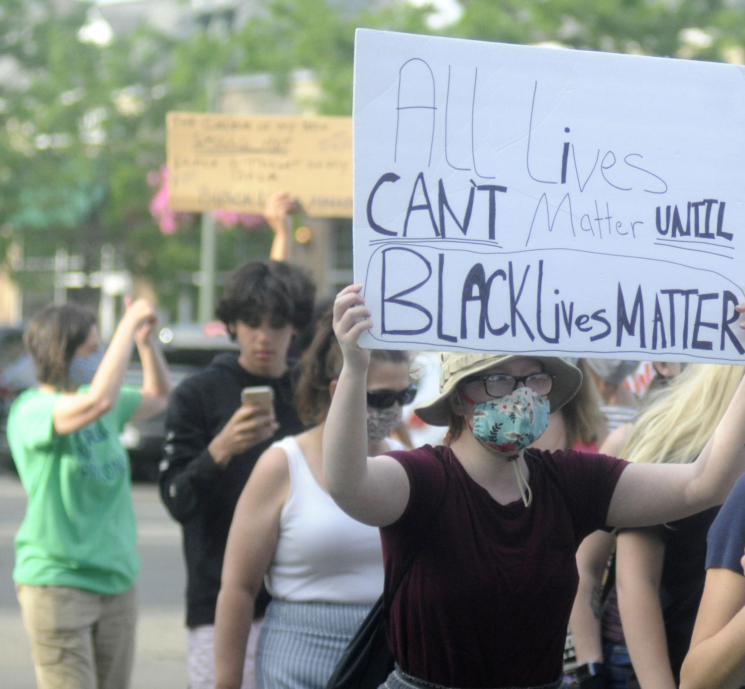 Protesters march on Main Street